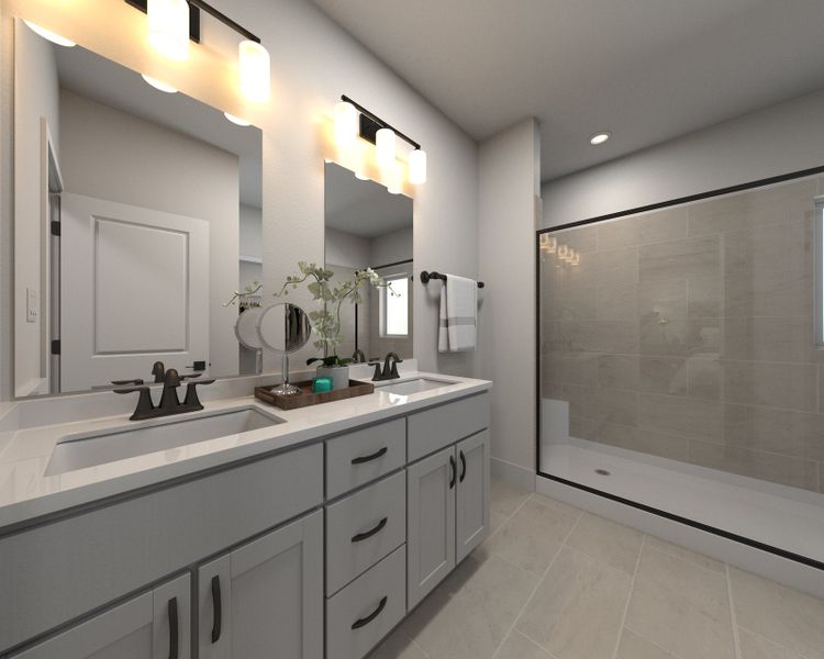 The primary bathroom offers dual vanity sinks and a walk-in shower.