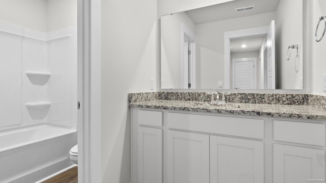 Furnished interior view inside a new home in Vineyard Trail, Jacksonville (Image 14).