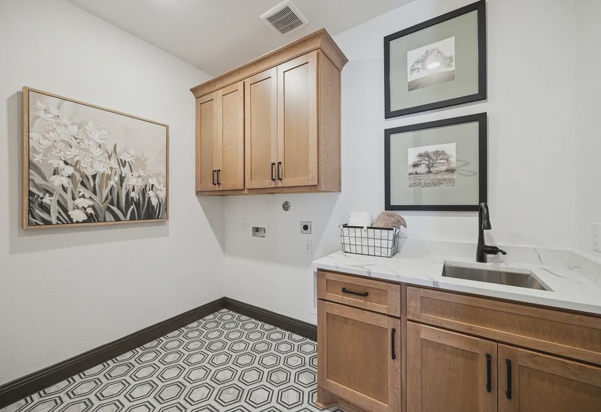 Plan 4534 laundry room - staged - 12 of 20 Plan 4534 laundry room - staged - 12 of 20