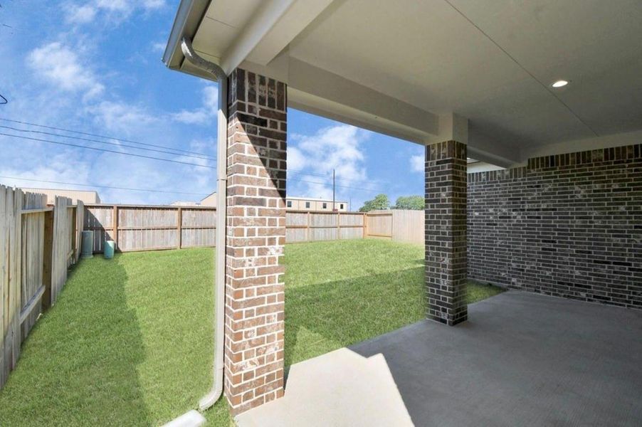 Exterior details and patio area of a home in Telge Ranch, Cypress (Image 3).