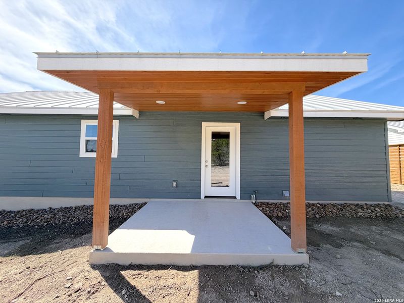 Exterior details and patio area of a home in , Spring Branch (Image 26).
