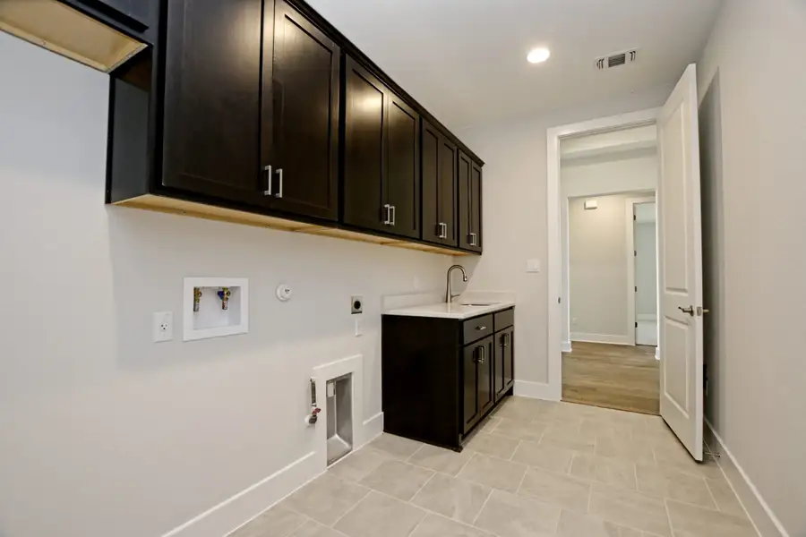 Furnished interior in a model home at Burnet Hilltop Estates in Cedar Park (Image 8).