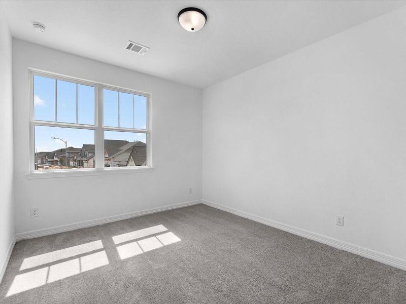 Spacious, unfurnished interior of a new home in Wildrye, Waller (Image 22).