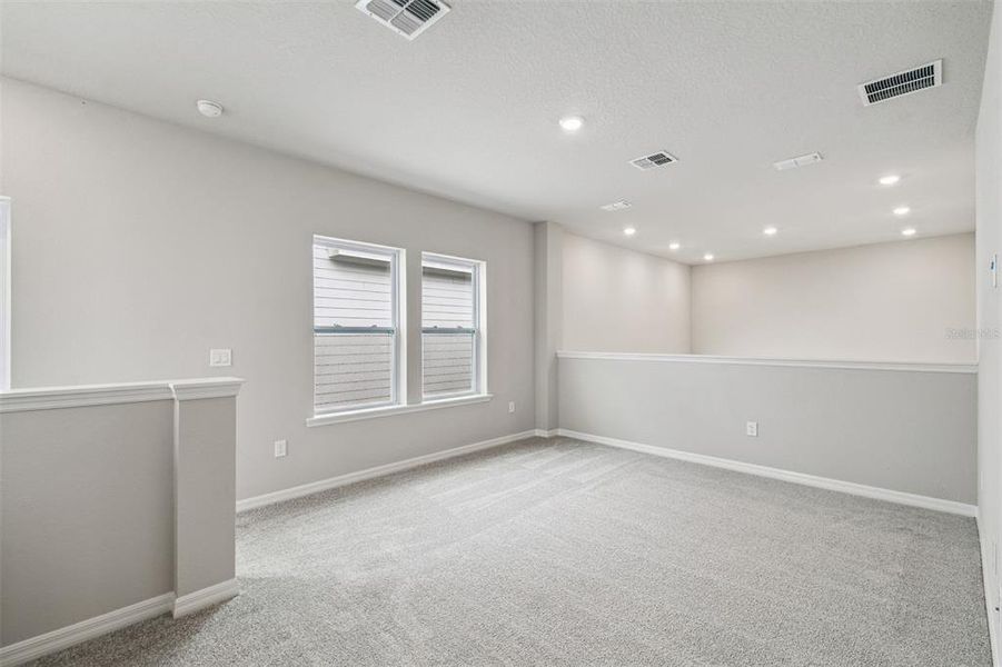 Spacious, unfurnished interior of a new home in Weslyn Park in Sunbridge 34', St. Cloud (Image 42).