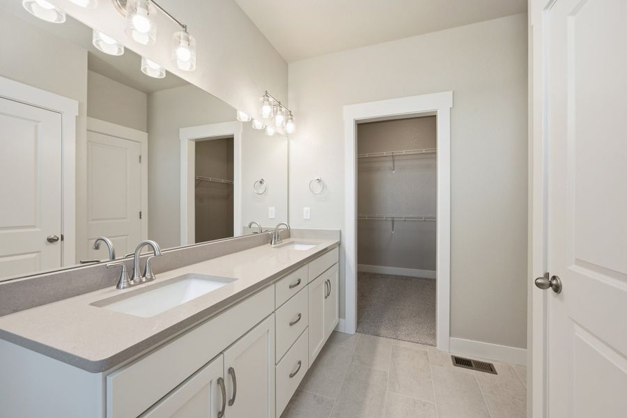 Furnished interior view inside a new home in The Lakes at Centerra, Loveland (Image 7).
