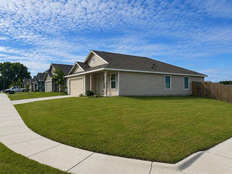 Front exterior of a new home in Wright Farms: Watermill Collection, Dallas, TX, highlighting curb appeal (Image 16).
