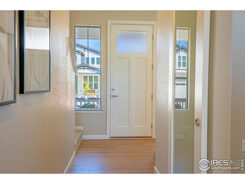 Inside front door with 2 story vaulted entry