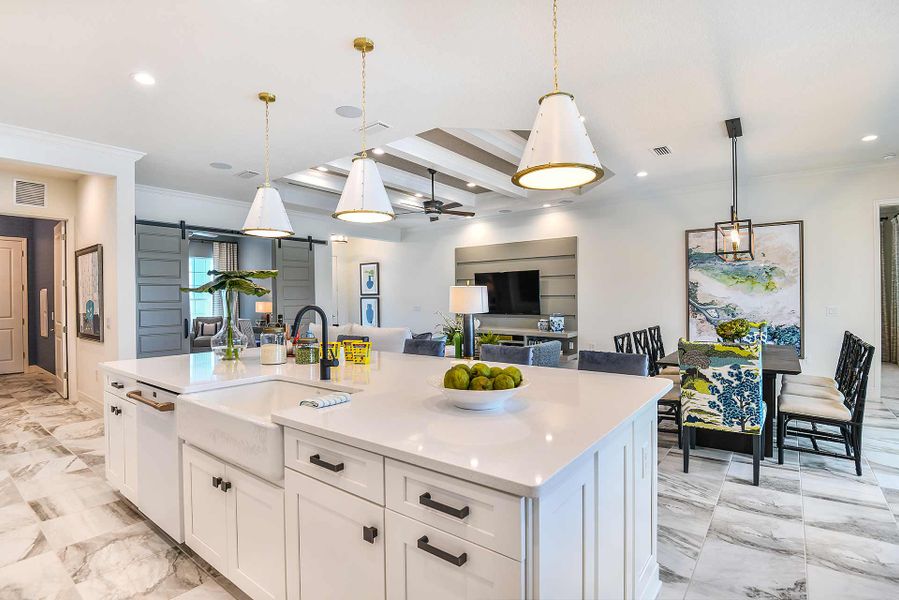 Representative furnished interior of a home built from the Savannah 2 by Neal Communities in SkySail, Naples (Image 10).