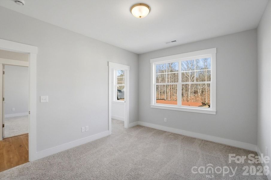 Spacious, unfurnished interior of a new home in Rone Creek, Waxhaw (Image 32).