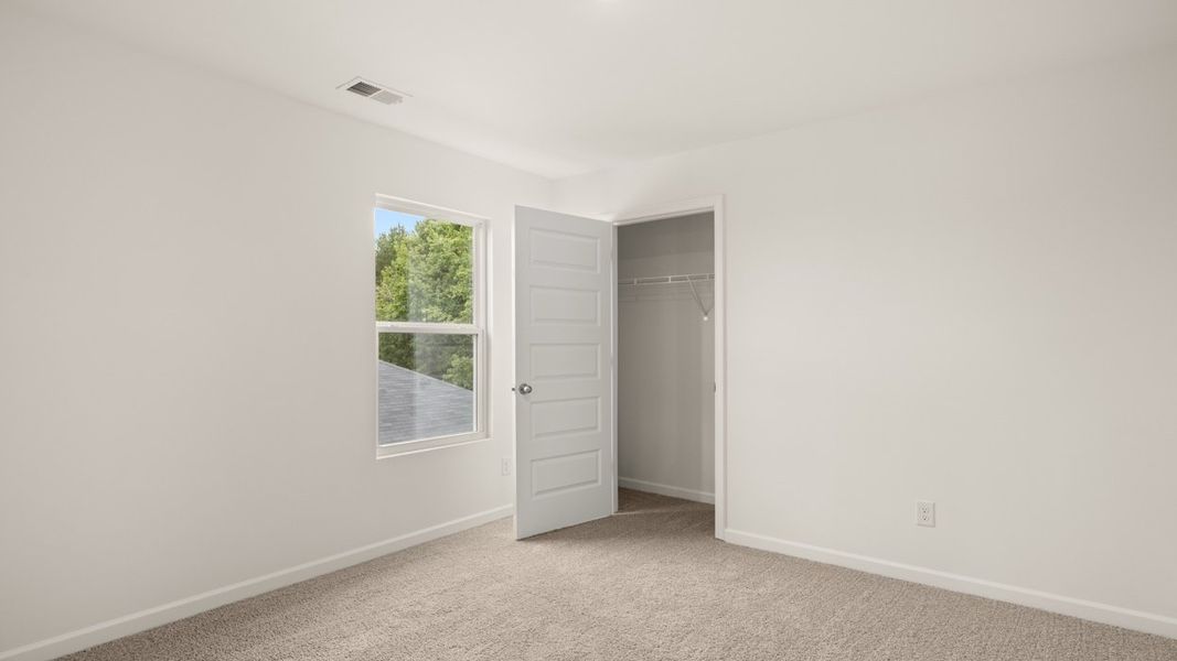 Representative unfurnished interior of a home built from the Hanover by D.R. Horton in The Reserve at Calcutta, Stockbridge (Image 21).