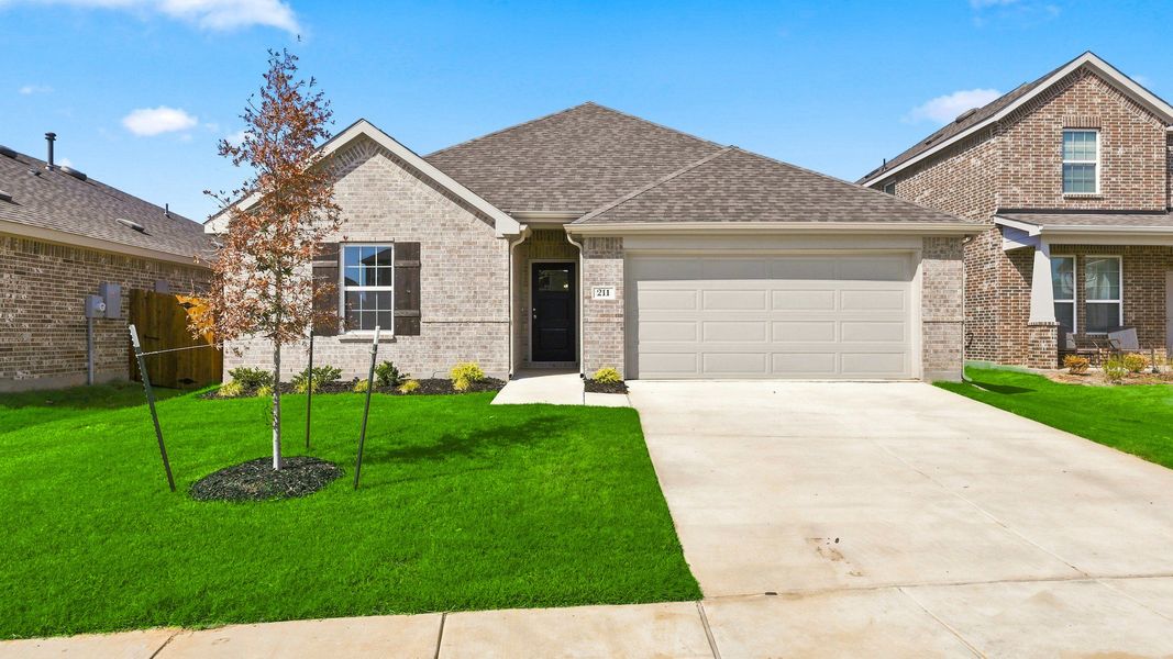 Front exterior of a new home in Patriot Estates, Venus, TX, highlighting curb appeal (Image 1). Front exterior of a new home in Patriot Estates, Venus, TX, highlighting curb appeal (Image 1).