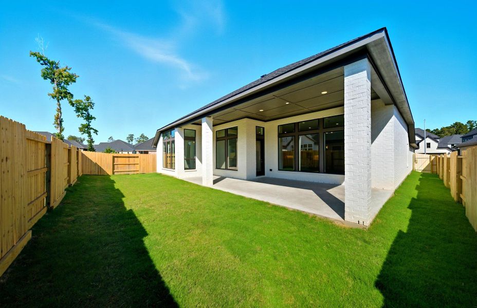 Exterior details and patio area of a home in Audubon 60', Magnolia (Image 21).