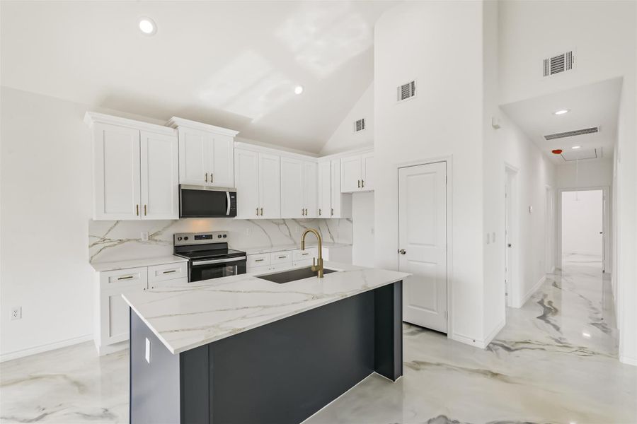 Furnished interior view inside a new home in Bridgeland, Cypress (Image 7).