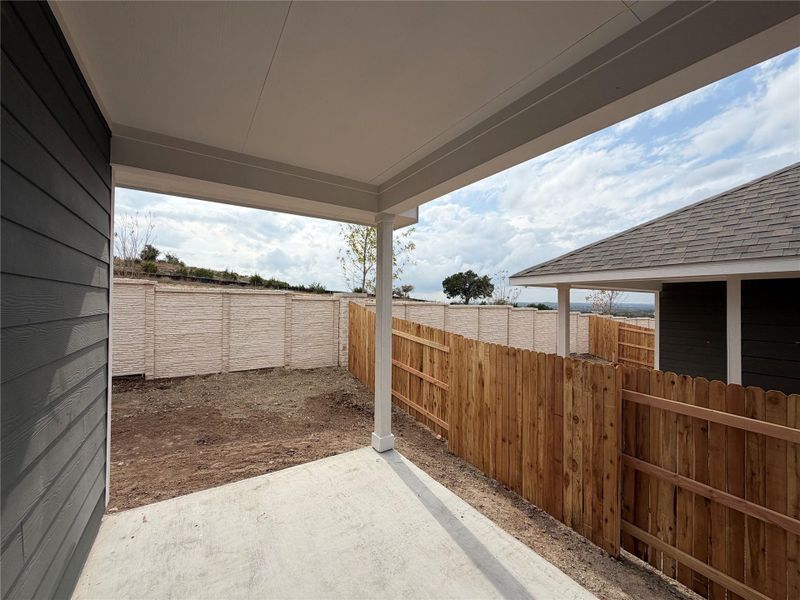 Exterior details and patio area of a home in Cannon Ranch 40s, Dripping Springs (Image 18).