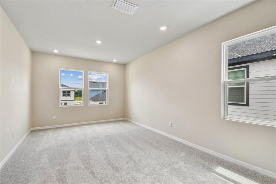 Spacious, unfurnished interior of a new home in Oakfield at Mount Dora Cottage Series, Mount Dora (Image 25).