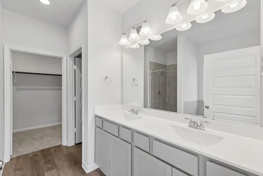 The Sparrow II- Primary Bathroom with Dual Vanities The Sparrow II- Primary Bathroom with Dual Vanities
