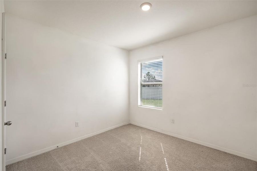 Spacious, unfurnished interior of a new home in Poinciana Enclave, Kissimmee (Image 25).