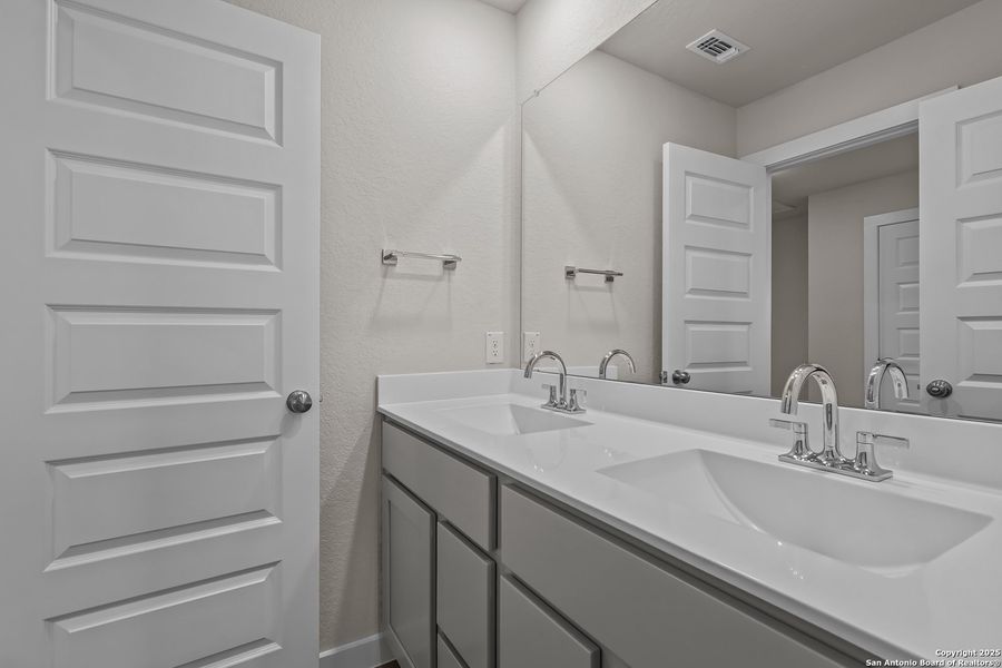 Furnished interior view inside a new home in Applewhite Meadows, San Antonio (Image 11). Furnished interior view inside a new home in Applewhite Meadows, San Antonio (Image 11).