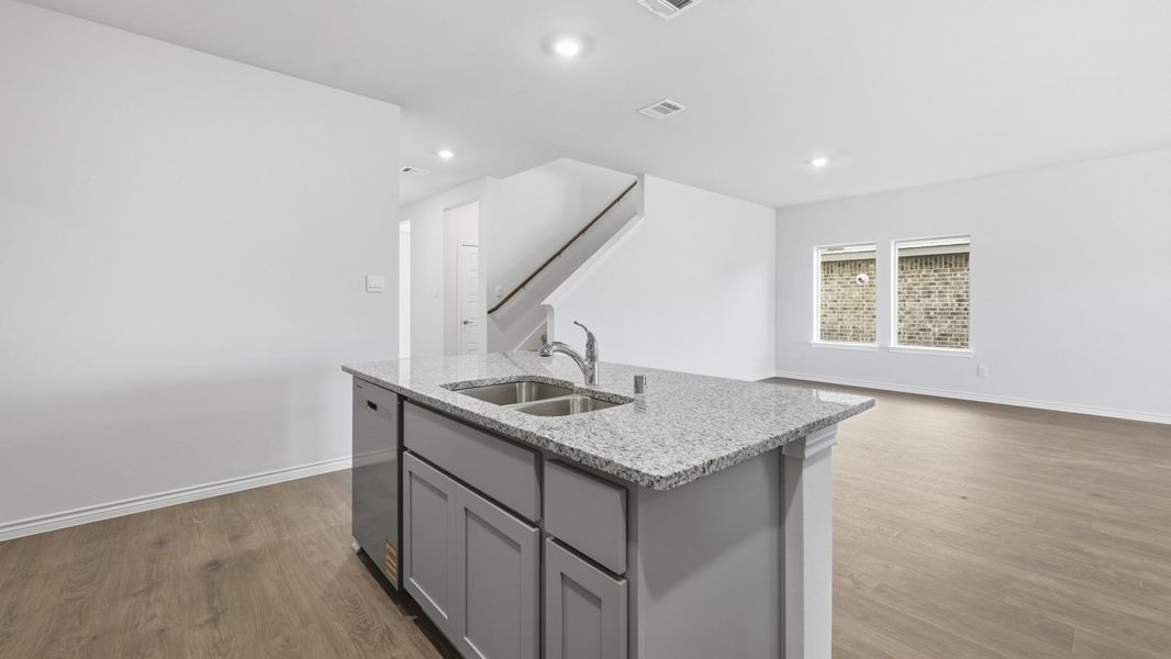 Representative furnished interior of a home built from the Palmview by D.R. Horton in Winchester Crossing, Princeton (Image 6).