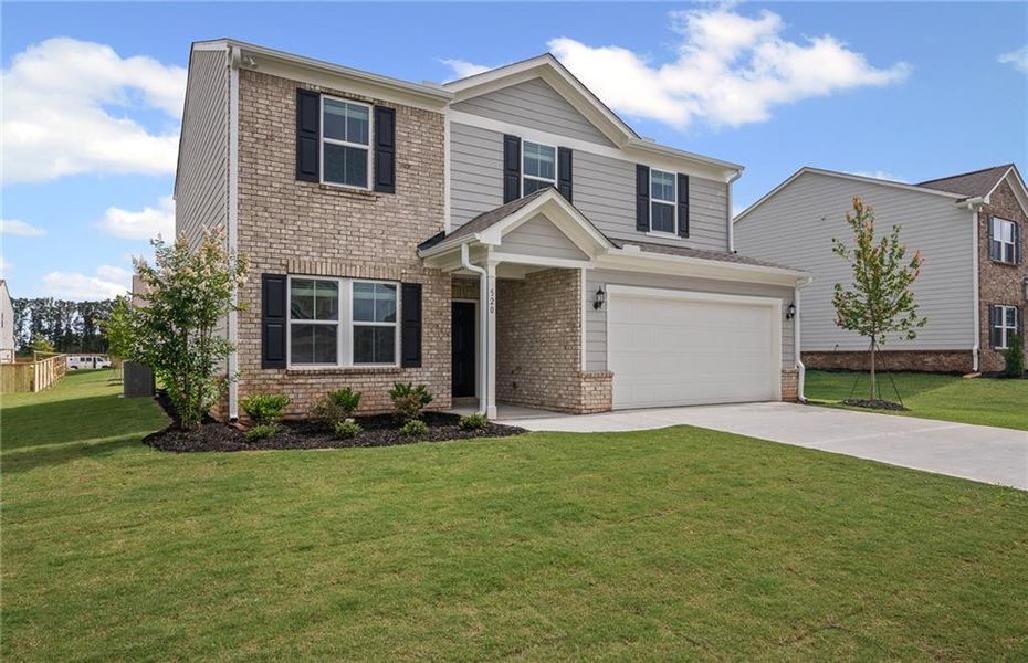Front exterior of a new home in Anderson Point, McDonough, GA, highlighting curb appeal (Image 1). Front exterior of a new home in Anderson Point, McDonough, GA, highlighting curb appeal (Image 1).