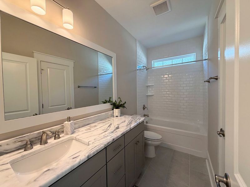 Furnished interior view inside a new home in Osprey Landing, Southport (Image 12).