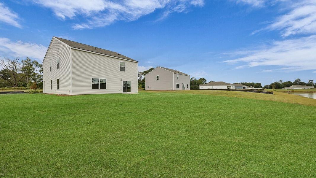 Exterior details and patio area of a home in Huggins Hill, Manning (Image 19).