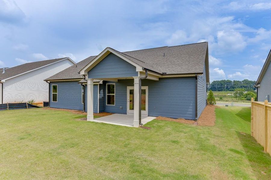 Front exterior of a new home in , Jefferson, GA, highlighting curb appeal (Image 1).