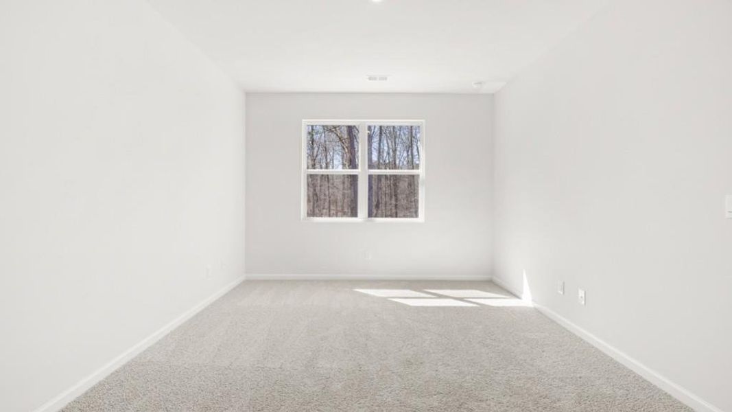 Spacious, unfurnished interior of a new home in South Wind, Fairburn (Image 20).