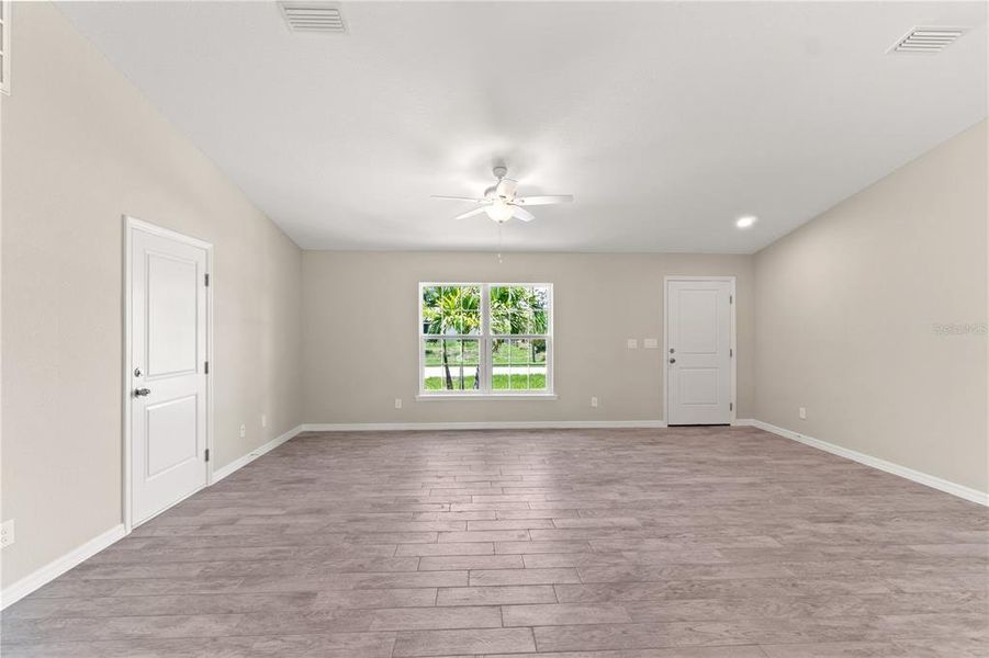 Spacious, unfurnished interior of a new home in , Port Charlotte (Image 13).