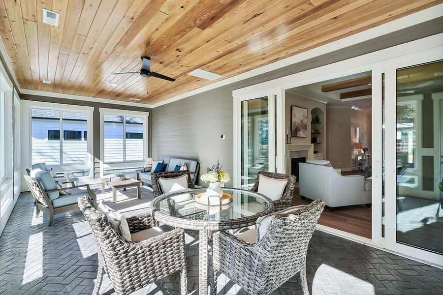 Exterior details and patio area of a home in The Bluffs On the Cape Fear, Leland (Image 27).