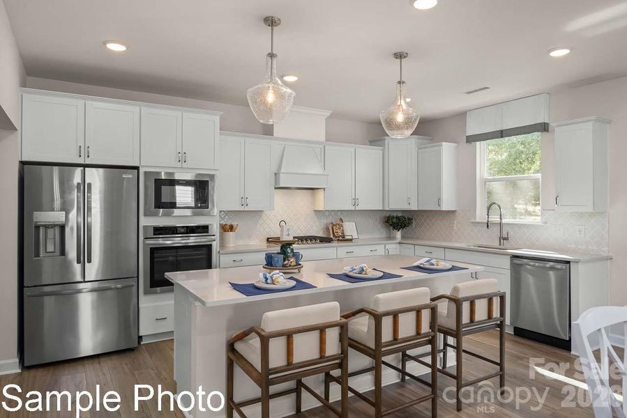 Furnished interior view inside a new home in Enclave at Belmont, Belmont (Image 4).