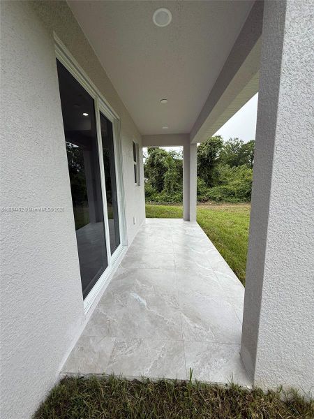 Exterior details and patio area of a home in , Lehigh Acres (Image 26). Exterior details and patio area of a home in , Lehigh Acres (Image 26).