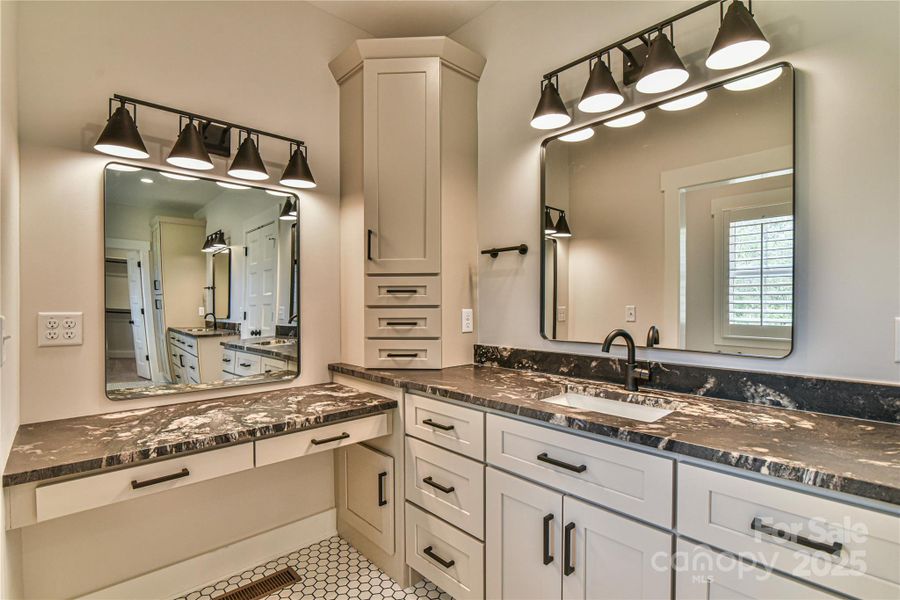 Primary bath with makeup area. Similar photo.