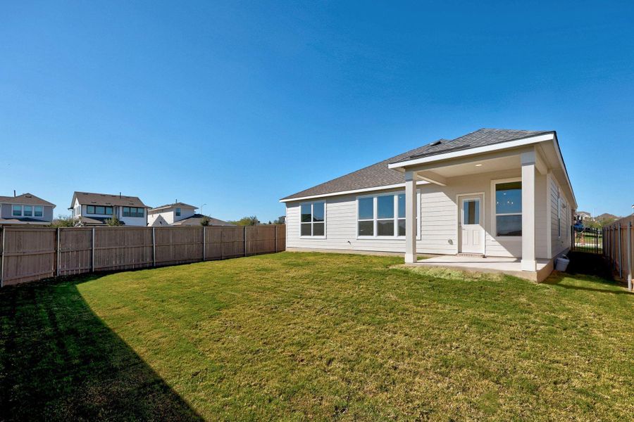 Exterior details and patio area of a home in McKinney Crossing, Austin (Image 3). Exterior details and patio area of a home in McKinney Crossing, Austin (Image 3).