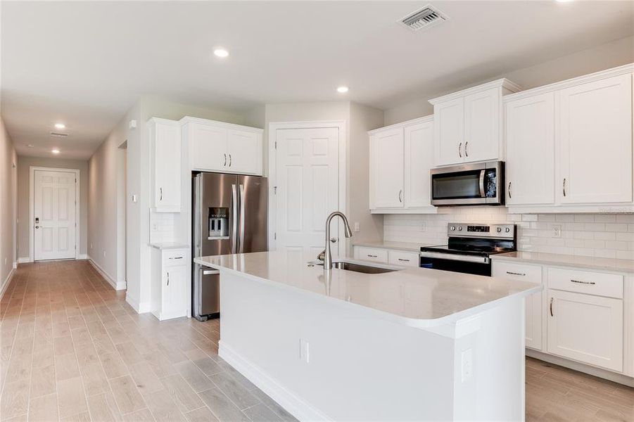 Furnished interior view inside a new home in Coral Lakes - Tradition & Express, Punta Gorda (Image 8).