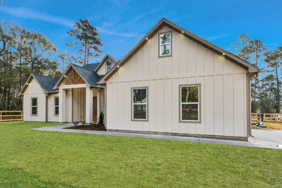 Front exterior of a new home in , Plantersville, TX, highlighting curb appeal (Image 24).