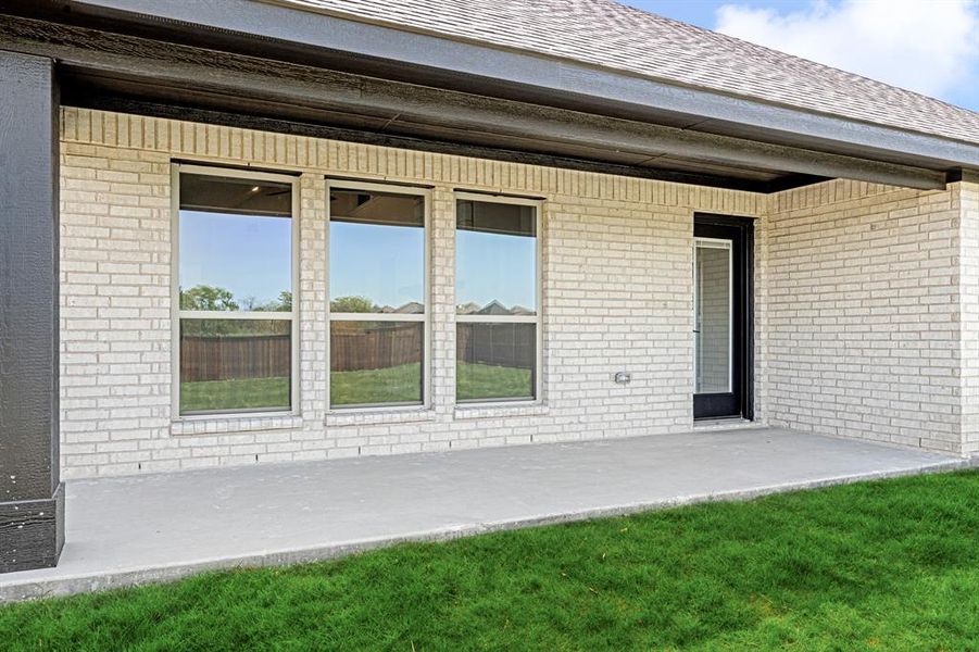 Exterior details and patio area of a home in Wildcat Ridge Phase 3, Godley (Image 26). Exterior details and patio area of a home in Wildcat Ridge Phase 3, Godley (Image 26).
