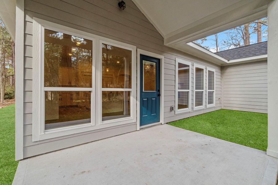 Exterior details and patio area of a home in , Trinity (Image 30).