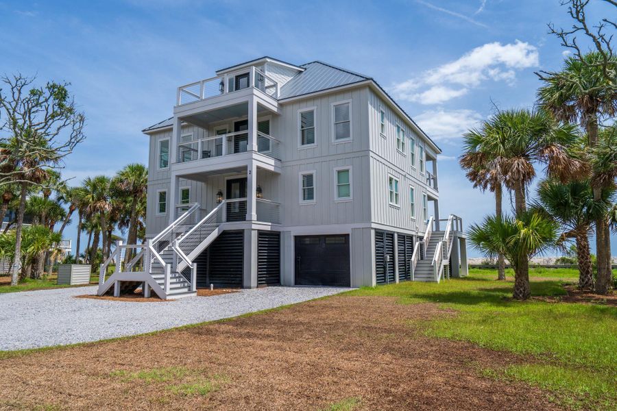 Exterior details and patio area of a home in , Edisto Island (Image 29).