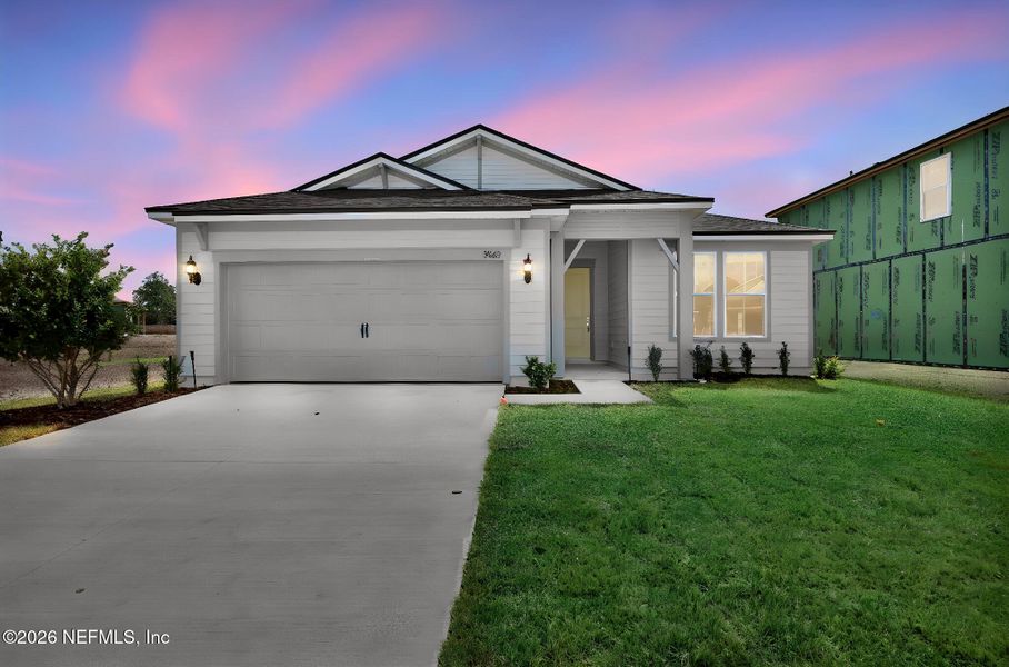 Front exterior of a new home in Hyland Trail, Green Cove Springs, FL, highlighting curb appeal (Image 24). Front exterior of a new home in Hyland Trail, Green Cove Springs, FL, highlighting curb appeal (Image 24).