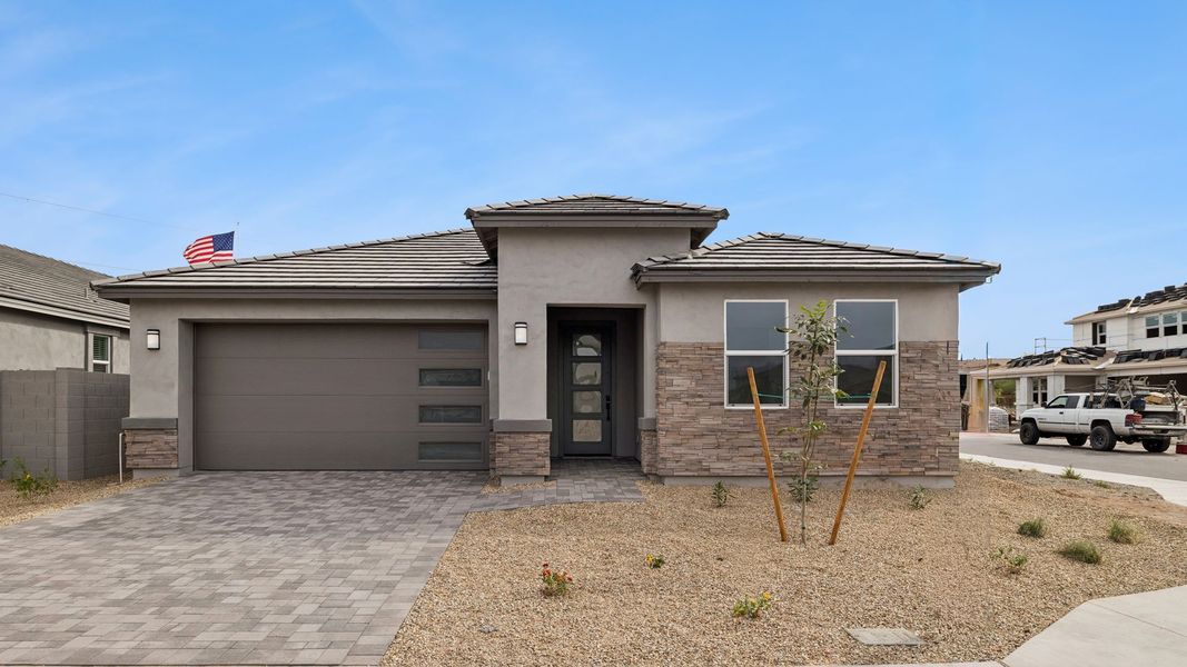 Representative exterior photo of a completed home built from the Tapatio by D.R. Horton in The Ridge at Stone Butte, Phoenix, AZ (Image 23).
