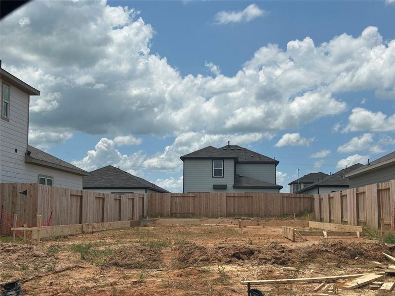 Front exterior of a new home in Lonestar Collection at Paloma at Sanford Farms, Waller, TX, highlighting curb appeal (Image 12).