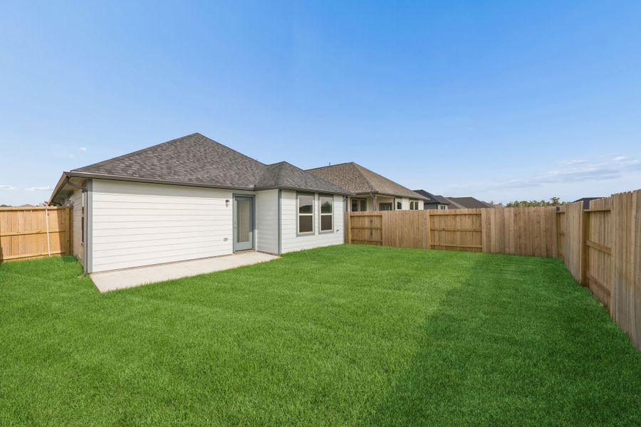 Exterior details and patio area of a home in Riviera Pines, Huffman (Image 4).