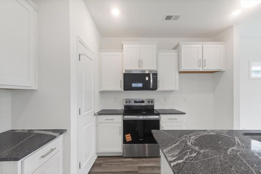 Furnished interior view inside a new home in Brownstone Park, Easley (Image 8).