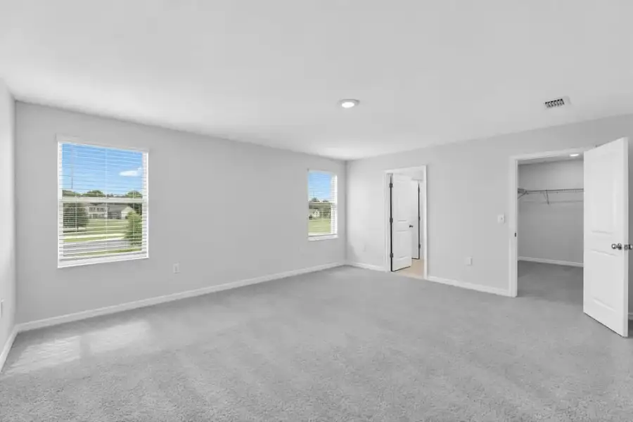 Representative unfurnished interior of a home built from the Dove by Taylor Morrison in Azure at Solaeris, Port St. Lucie (Image 26).