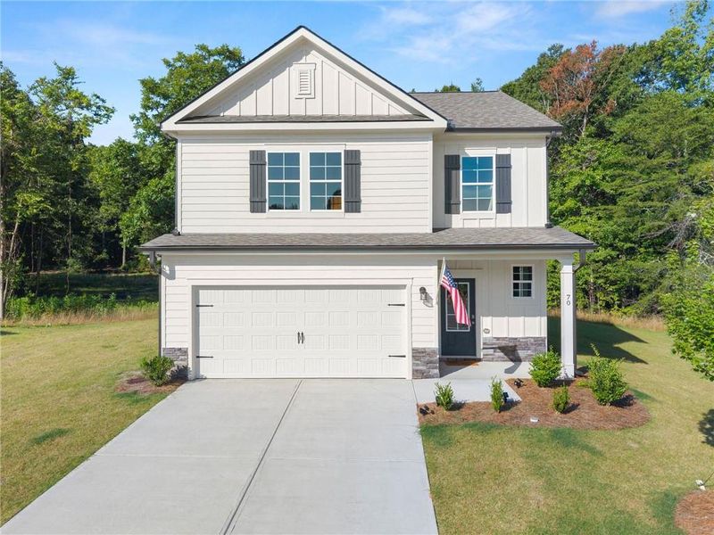 Front exterior of a new home in Ellington Farms, Statham, GA, highlighting curb appeal (Image 23).