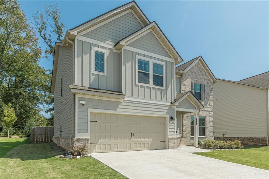 Front exterior of a new home in Dixon Farm, Fayetteville, GA, highlighting curb appeal (Image 20).