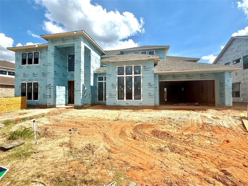 Exterior details and patio area of a home in Grand Central Park Deer Lake Estates, Conroe (Image 15). Exterior details and patio area of a home in Grand Central Park Deer Lake Estates, Conroe (Image 15).