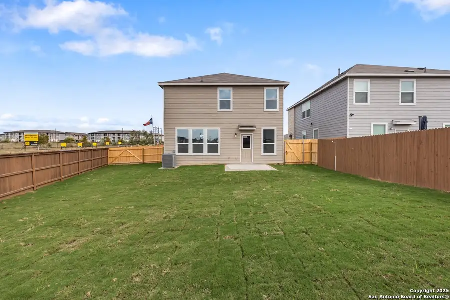 Exterior details and patio area of a home in Southton Cove, Elmendorf (Image 3).