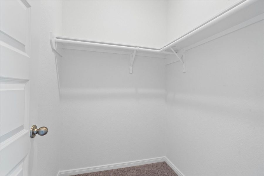 The second walk-in closet is located at the entrance to the primary bathroom. The second walk-in closet is located at the entrance to the primary bathroom.